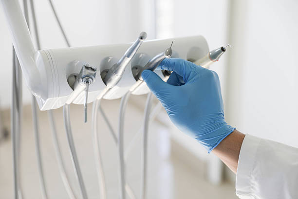 Professional Invisalign Clear Aligners technician working in Stockdale, TX